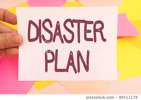 Writing displaying text Disaster Plan. Business showcase Respond to Emergency Preparedness Survival and First Aid Kit Multiple Assorted Collection Office Stationery Photo Placed Over Table 90511178