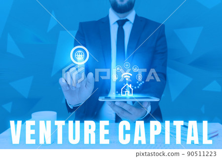 Inspiration showing sign Venture Capital. Word Written on financing provided by firms to small early stage ones Man holding Screen Of Mobile Phone Showing The Futuristic Technology. 90511223