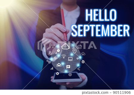Text showing inspiration Hello September. Business idea Eagerly wanting a warm welcome to the month of September Lady Pressing Screen Of Mobile Phone Showing The Futuristic Technology 90511906