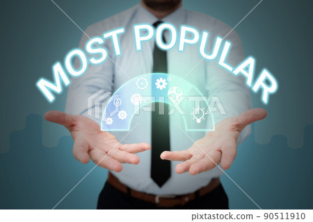 Text showing inspiration Most Popular. Business idea Liked Followed Enjoyed by majority of the showing in a society Businessman in suit holding open palms represents innovative thinking. Text showing inspiration Most Popular. Business idea Liked Followed Enjoyed by majority of the showing in a society Businessman in suit holding open palms represents innovative thinking. 90511910