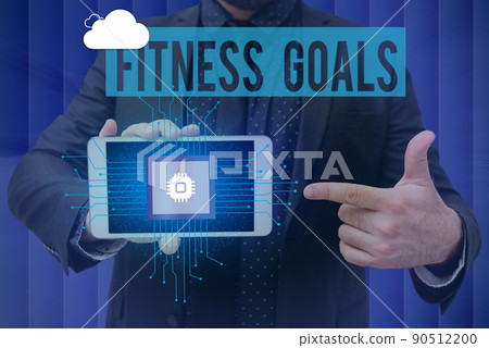 Writing displaying text Fitness Goals. Business concept Loose fat Build muscle Getting stronger Conditioning Man holding Screen Of Mobile Phone Showing The Futuristic Technology. Writing displaying text Fitness Goals. Business concept Loose fat Build muscle Getting stronger Conditioning Man holding Screen Of Mobile Phone Showing The Futuristic Technology. 90512200