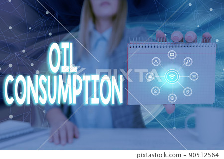 Sign displaying Oil Consumption. Word for This entry is the total oil consumed in barrels per day Lady Pressing Screen Of Mobile Phone Showing The Futuristic Technology Sign displaying Oil Consumption. Word for This entry is the total oil consumed in barrels per day Lady Pressing Screen Of Mobile Phone Showing The Futuristic Technology 90512564