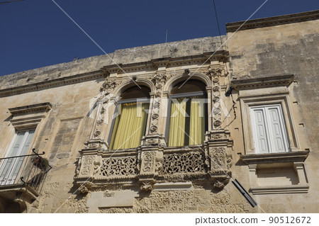 Baroque style balcony. Apulia region,Lecce, Italy. Baroque style balcony. Apulia region,Lecce, Italy. 90512672