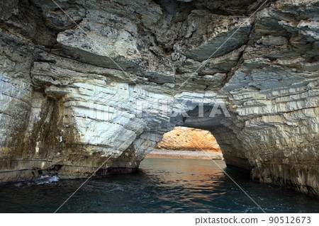 A cave along the Gargano pesinsula, Apulia region, Italy. A cave along the Gargano pesinsula, Apulia region, Italy. 90512673