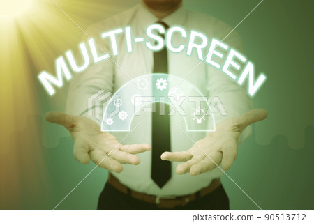 Text showing inspiration Multi Screen. Business idea Having or involving several screen especially in a cinema Businessman in suit holding open palms represents innovative thinking. 90513712