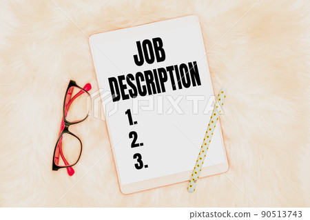 Handwriting text Job Description. Business idea A document that describes the responsibilities of a position Office Supplies Over Desk With Keyboard And Glasses And Coffee Cup For Working 90513743
