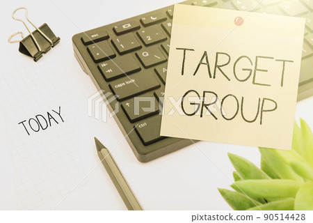 Hand writing sign Target Group. Business idea Particular showing that an advertisement intended to reach to Computer Keyboard And Symbol.Information Medium For Communication. 90514428