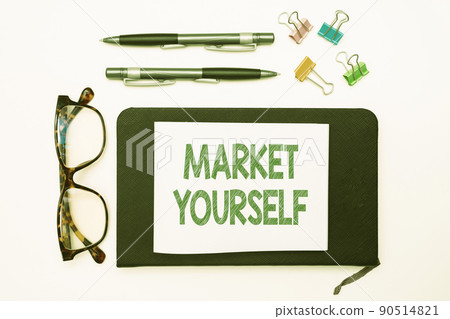 Text caption presenting Market Yourself. Business concept Making yourself for any kind of task and project in life Office Supplies Over Desk With Keyboard And Glasses And Coffee Cup For Working 90514821