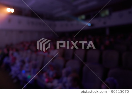 Event hall with chairs on a blurry background. The audience of a music concert hall or a conference hall for seminars in the educational and creative business. High quality photo Event hall with chairs on a blurry background. The audience of a music concert hall or a conference hall for seminars in the educational and creative business. High quality photo 90515070