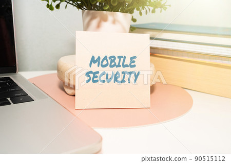 Writing displaying text Mobile Security. Business overview Protection of mobile phone from threats and vulnerabilities Office Supplies Over Desk With Keyboard And Glasses And Coffee Cup For Working Writing displaying text Mobile Security. Business overview Protection of mobile phone from threats and vulnerabilities Office Supplies Over Desk With Keyboard And Glasses And Coffee Cup For Working 90515112