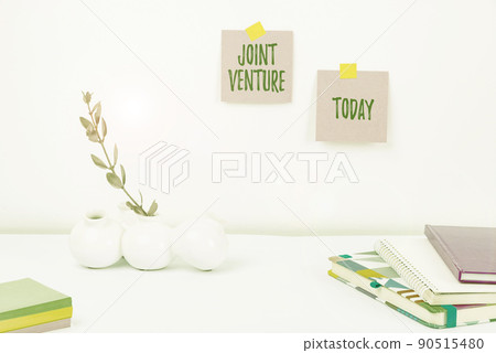 Conceptual caption Joint Venture. Business idea Collaboration Arrangement Parties Partnership Team Tidy Workspace Setup, Writing Desk Tools Equipment, Smart Office 90515480