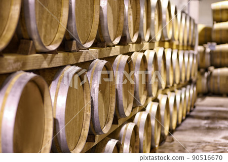 The aging process in action. Cropped shot of a distillery. The aging process in action. Cropped shot of a distillery. 90516670