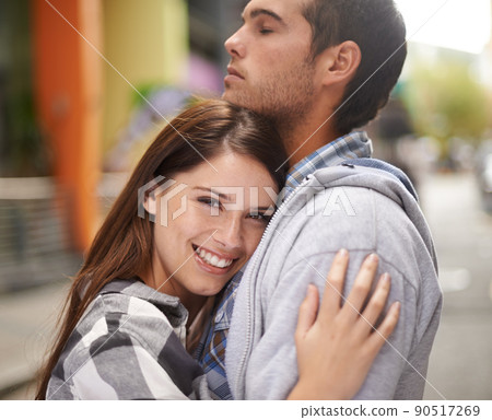 Bonding on this special day. A young couple outside. Bonding on this special day. A young couple outside. 90517269