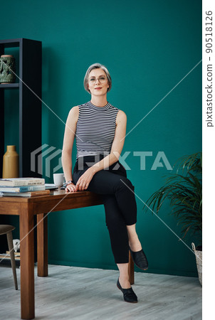 You gotta keep going until you get to the top. Shot of a mature businesswoman in a modern office. 90518126