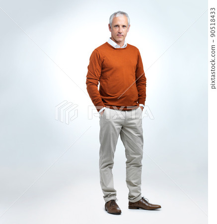 A man who knows what he wants. A studio portrait of a casual mature man. A man who knows what he wants. A studio portrait of a casual mature man. 90518433
