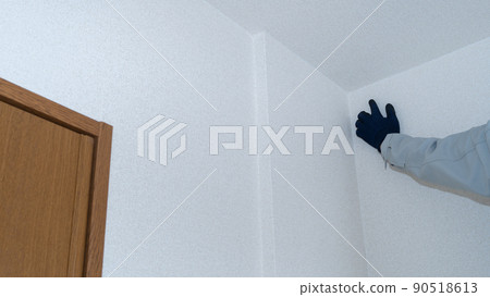 Workers inspecting wallpaper | Remodeling survey / estimate image 90518613