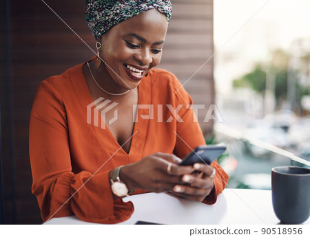 She understands the importance of communication. Cropped shot of an attractive businesswoman sending a text while working in her office. She understands the importance of communication. Cropped shot of an attractive businesswoman sending a text while working in her office. 90518956