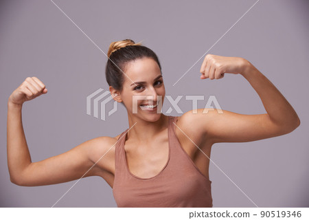 Shes got subtle con. An attractive young woman against a purple background. 90519346