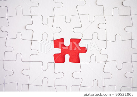 missing piece of jigsaw puzzle with red background missing piece of jigsaw puzzle with red background 90521003