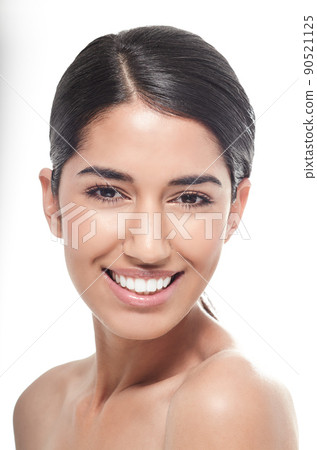 Fresh beauty with a truly engaging smile. Studio portrait of a beautiful young woman smiling at the camera, isolated on white. Fresh beauty with a truly engaging smile. Studio portrait of a beautiful young woman smiling at the camera, isolated on white. 90521125
