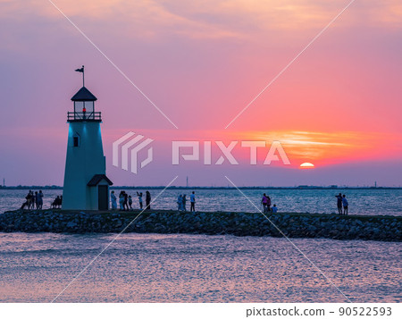 Sunset view of the lighthouse of Lake Hefner 90522593