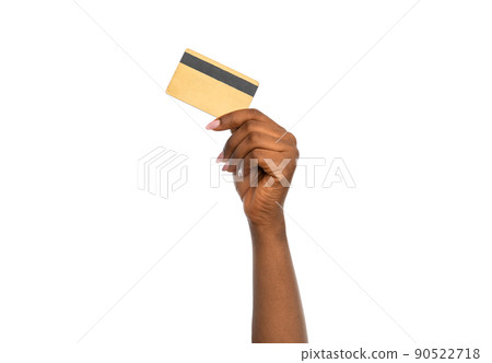 close up of hand with golden credit card close up of hand with golden credit card 90522718