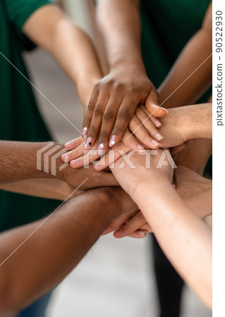 close up of volunteers stacking hands close up of volunteers stacking hands 90522930