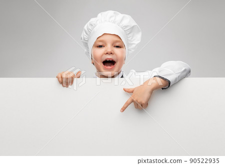 happy little girl in chef's toque with white board happy little girl in chef's toque with white board 90522935