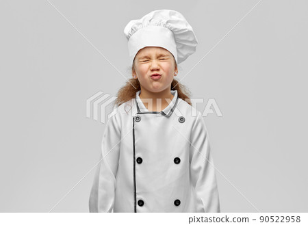 little girl in chef's toque and jacket 90522958