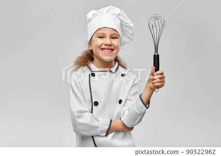 smiling little girl in chef's toque with whisk 90522962