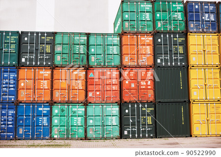 Safe storage for special cargo. A photo of colorful containers stacked on top of one another with copyspace.. Safe storage for special cargo. A photo of colorful containers stacked on top of one another with copyspace.. 90522990