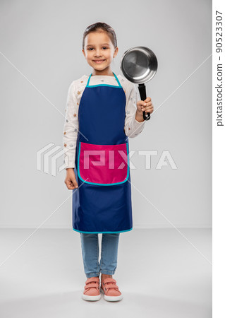 little girl in apron with saucepan 90523307