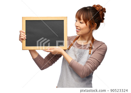 happy woman in apron with chalkboard 90523324