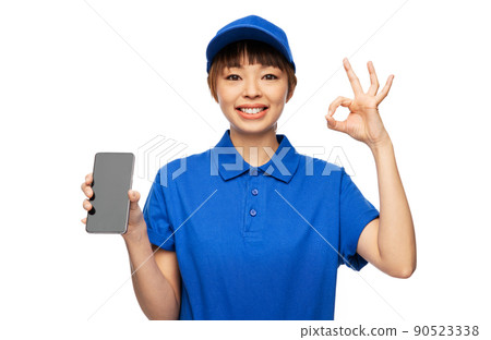 delivery woman with smartphone showing ok gesture delivery woman with smartphone showing ok gesture 90523338
