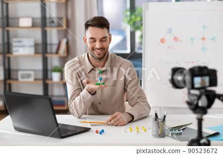 chemistry teacher with camera having online class chemistry teacher with camera having online class 90523672