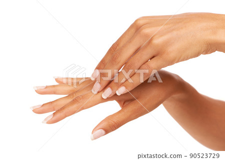 Loving the soft feeling of her skin. A young woman feeling her silky, smooth skin while isolated on a white background. Loving the soft feeling of her skin. A young woman feeling her silky, smooth skin while isolated on a white background. 90523729