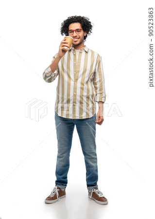 smiling young man with takeaway coffee cup smiling young man with takeaway coffee cup 90523863