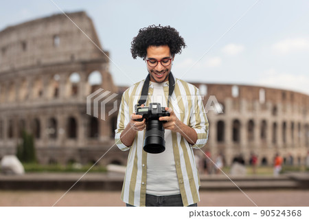 smiling man or photographer with camera in rome smiling man or photographer with camera in rome 90524368