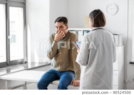 doctor and smiling man meeting at hospital doctor and smiling man meeting at hospital 90524500