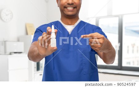 smiling doctor or male nurse with medicine 90524597