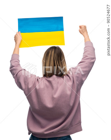 woman holding flag of ukraine on demonstration woman holding flag of ukraine on demonstration 90524677
