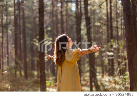 woman or witch performing magic ritual in forest woman or witch performing magic ritual in forest 90524995