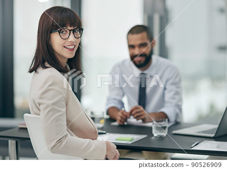 Hes a great asset to me and the company. Cropped portrait of a young businesswoman working with a male colleague in the office. Hes a great asset to me and the company. Cropped portrait of a young businesswoman working with a male colleague in the office. 90526909