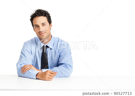 Working with an attitude of positivity. Studio shot of a handsome businessman posing against a white background. Working with an attitude of positivity. Studio shot of a handsome businessman posing against a white background. 90527713