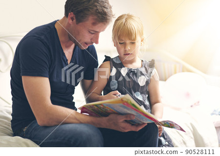 Hes always there for her. Shot of a single dad helping his daughter with her homework. Hes always there for her. Shot of a single dad helping his daughter with her homework. 90528111