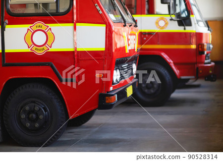 Ready for action. Cropped shot of parked fire engines. 90528314
