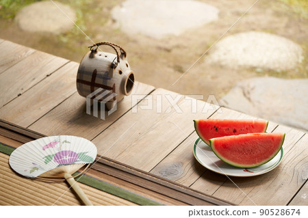 Watermelon placed on the porch 90528674