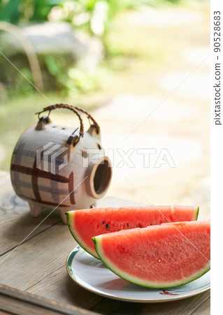 Watermelon placed on the porch 90528683