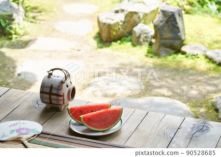 Watermelon placed on the porch 90528685