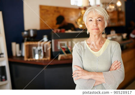 I invested in a small business after retirement. Portrait of a senior woman working in a coffee shop. I invested in a small business after retirement. Portrait of a senior woman working in a coffee shop. 90528917